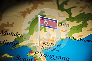 North Korea marked with a flag on the map