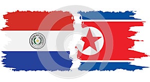 North Korea and Paraguay grunge flags connection vector