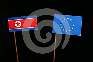 North Korean flag with European Union EU flag on black