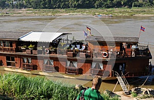 North-Laos: Mekong River cruise ship ankering near Luang Brabang