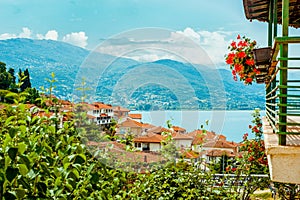 North macedonia. Ohrid. Roofs buildings and houses alonge lake shore with mountains and lake on background