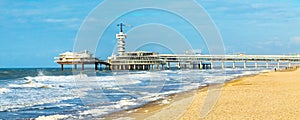 North Sea beach and Scheveningen Pier near Hague, Holland