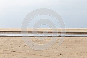 North sea dike landscape at low tide