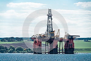 North Sea oil drilling rig moored in the Cromarty Firth, Scotland photo