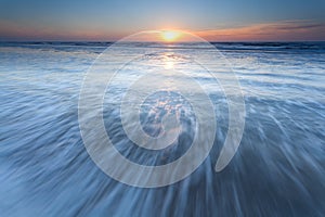 North sea waves at sunset