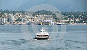 North Vancouver cityscape and sea bus. photo