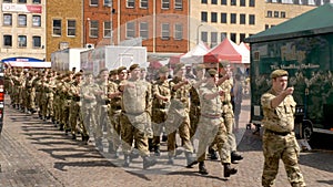 Northampton UK: 29 June 2019 - Armed Forces Day Parade Troops marching on Market Square