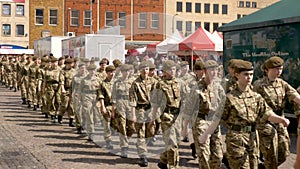 Northampton UK: 29 June 2019 - Armed Forces Day Parade Troops marching on Market Square