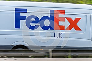 Northampton, UK - May 10th 2019: fedex uk delivery van on british motorway in motion