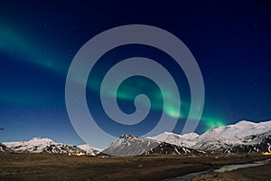 Northen lights over the mountain in Iceland