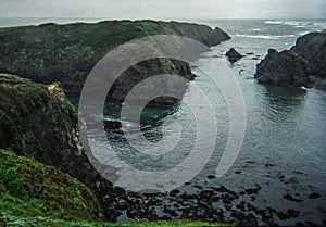 Northern California coastal cliffs with moody atmosphere at Mendocino