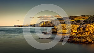 Northern Ireland Antrim Coast Ballintoy Harbour long exposure rocks sunset waves beautiful scenery