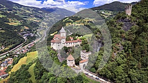 Northern Italy travel and landmarks. majestic medieval castle Trostburg aerial drone view