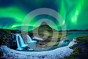 Northern Light, Aurora borealis at Kirkjufell in Iceland. Kirkjufell mountains in winter