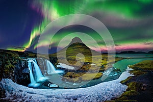 Northern Light, Aurora borealis at Kirkjufell in Iceland. Kirkjufell mountains in winter