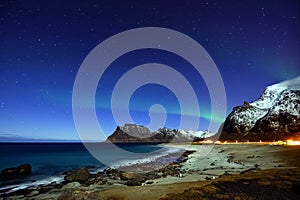 Northern lights the arctic beach at Utakleiv, Lofoten