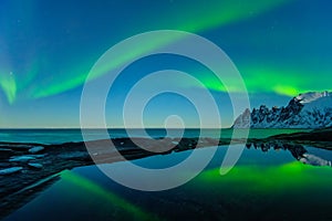 Northern lights, Aurora Borealis, Devil Teeth mountains in the background, Tungeneset, Senja, Norway