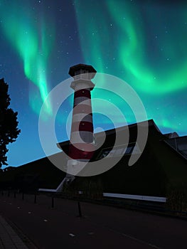 Northern Lights over a Lighthouse