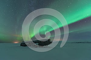 Northern lights over plane wreckage in iceland