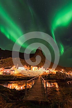 Northern lights over the Reine fishing village, Lofoten islands