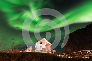 Northern lights over the Reine fishing village, Lofoten islands