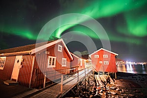 Northern lights over the Reine fishing village, Lofoten islands