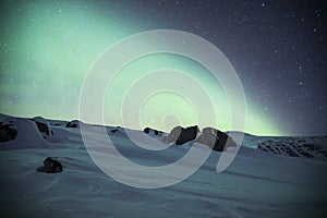 Northern lights in Reinheim Cabin, Dovrefjell National Park, Norway