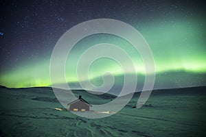 Northern lights in Reinheim Cabin, Dovrefjell National Park, Norway