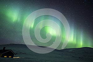 Northern lights in Reinheim Cabin, Dovrefjell National Park, Norway