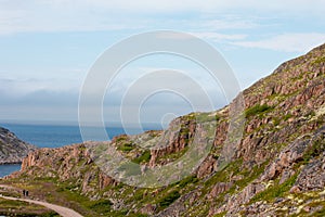 Northern mountains, the sea and mountain cold lakes on the Kola peninsula. e