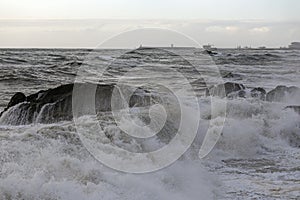 Oporto stormy seascape seeing Leixoes harbor entry photo