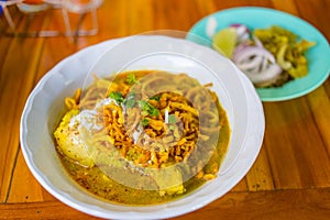 Northern Thai Curry Noodles with Chicken Khao Soi Kai is a traditional signature food of Northern of Thailand. Taste of soup has