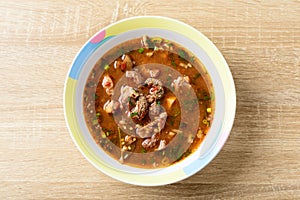 Northern Thai food, spicy Thai curry soup with beef guts Kaeng Om Nua photo