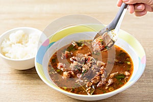 Northern Thai food, spicy Thai curry soup with beef guts Kaeng Om Nua photo