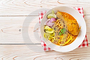 Northern Thai noodle curry soup with chicken