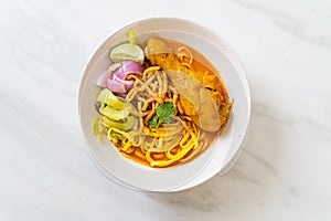 Northern Thai noodle curry soup with chicken