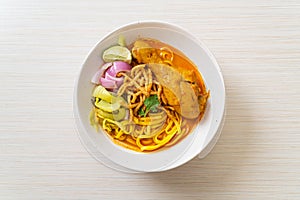 Northern Thai noodle curry soup with chicken