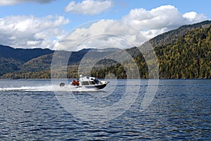 The NorthSilver PRO 745 Cabin boat of the transport police is patrolling the waters of Lake Teletskoye. Altai Republic