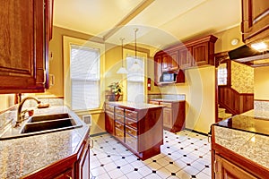 Northwest kitchen room interior with cabinets, kitchen island an