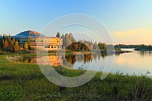 Northwest Territories Assembly Building on Frame Lake in Evening Sun, Yellowknife, Canada