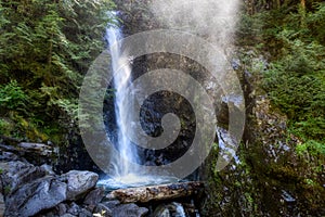 Norvan Falls and river stream in the natural canyon photo