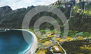 Norway aerial view Storvika beach and sea with mountains above village landscape