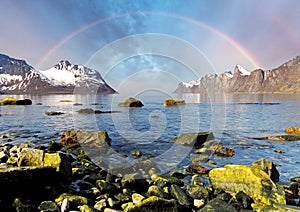 Norway fjord with rainbow over sea