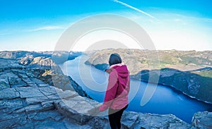 Norway - A girl looking at the Lysefjorden