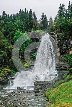 Norway, Hordaland county. Famous Steinsdalsfossen waterfall. Scandinavian nature.