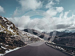 Norway, narrow and twisty road up to Dalsnibba mountain top with snow