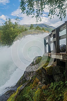 Norway waterfall landscape on a summer day .