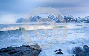 Norway winter storm and big waves  landscape with heavy snow ,polar circle whether