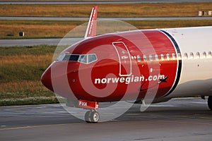 Norwegian Air Shuttle plane taxiing, close-up view