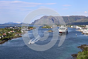 Norwegian coastal steamer leaving port of Bronnoysund